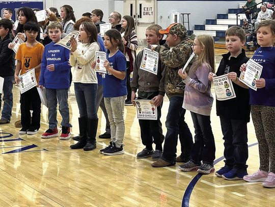 LES award recognition held at home basketball game