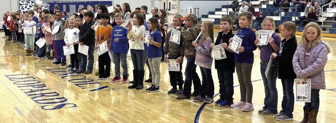 LES award recognition held at home basketball game