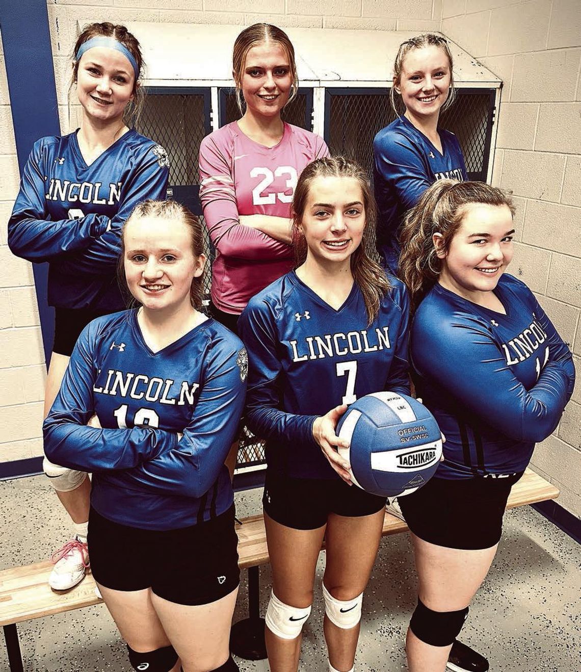 Lincoln Volleyball players celebrate Senior Nigh